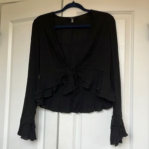 Black ruffle front tie blouse